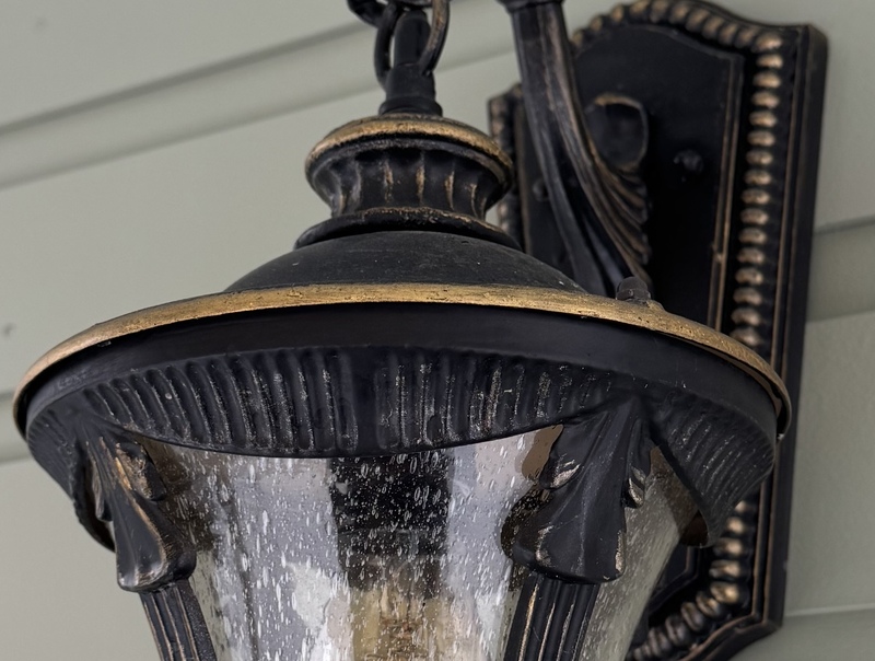 Victorian-revival wall lantern restored in aged black with gilt highlights, rewired and weather-sealed for modern use.